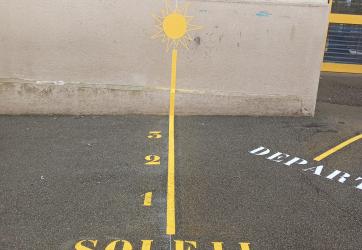 traçage du jeu 123 soleil dans une cour d'école