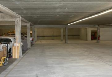 préparation de sol d'une dalle béton de parking : ponçage diamant avant résine