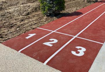 Traçage d'une piste d'athlétisme à 3 couloirs